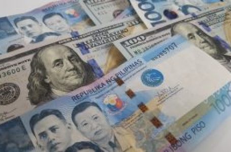 Peso sinks to P57:$1 on US data