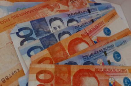 Peso slides to over two-year low